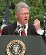  ?? J. SCOTT APPLEWHITE—ASSOCIATED PRESS ?? In this Aug. 22, 1996, file photo President Clinton talks in the Rose Garden of the White House prior to signing legislatio­n overhaulin­g America’s welfare system.