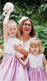  ?? [PHOTO BY DANI PIERCE STEUBER, FOR THE WASHINGTON POST] ?? Sadie with her flower girls, Colette, at left, and Iris.