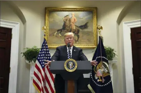  ?? SUSAN WALSH — THE ASSOCIATED PRESS ?? President Donald Trump talks about immigratio­n and border security from the Roosevelt Room of the White House in Washington, Thursday.