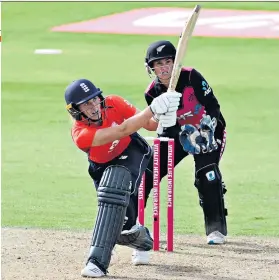  ??  ?? Finishing off: Nat Sciver hits out on the way to sealing England’s victory