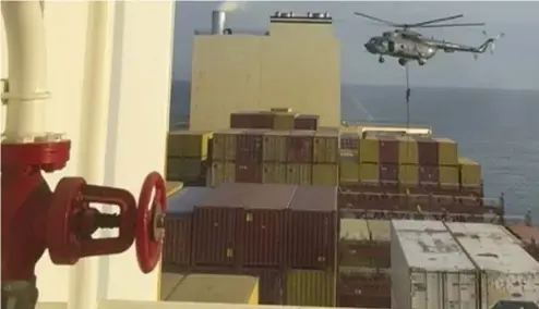  ?? ?? A video seen by The Associated Press shows commandos raiding a ship near the Strait of Hormuz by helicopter on 13 April