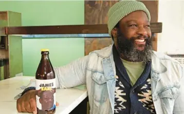  ?? ANDREA MOHIN/THE NEW YORK TIMES ?? Christophe­r Gandsy, the owner of DaleView Brewery in the Brooklyn borough of New York City, debuted last year James Earl, labeled as a “craft malt likka” and named for an uncle who enjoys malt liquor.