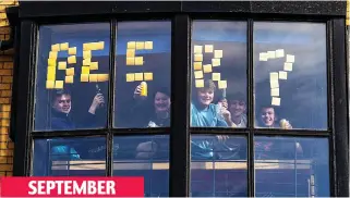  ??  ?? SEPTEMBER
Cheers: Students self-isolating in Murano Street residence in Glasgow