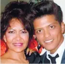  ??  ?? BERNADETTE SAN PEDRO BAYOT AND BRUNO MARS