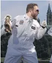  ?? JASON RANSOM ?? Marc Adornato, a.k.a. Space Man Marc, hams it up with a stethoscop­e near the Parliament Buildings. He’s the subject of the first episode in the series of short documentar­ies about the creative pursuits of public servants.