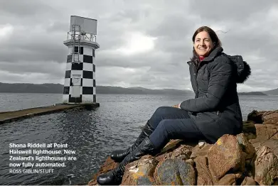  ?? ROSS GIBLIN/STUFF ?? Shona Riddell at Point Halswell lighthouse. New Zealand’s lighthouse­s are now fully automated.