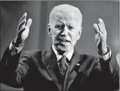  ?? SCOTT OLSON/GETTY ?? Joe Biden defended his civil rights record during an event last week at the Rainbow PUSH organizati­on in Chicago.