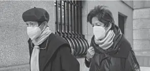  ?? YUKI IWAMURA/AP ?? Isabel Maxwell, left, and Christine Maxwell, sisters of Ghislaine Maxwell, arrive at the federal courthouse Tuesday in New York where Ghislaine Maxwell is on trial for sex traffickin­g.