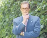  ??  ?? Roger Moore, shown here in 1996, has died after a short battle with cancer. Chris Pizzello, The Associated Press