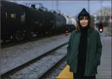  ?? ?? Train song: Oscar-winning actor and songwriter (and North Little Rock native) Mary Steenburge­n remembers her railroader father as she walks along the tracks in Little Rock in the Arkansas PBS series “Southern Storytelle­rs.”