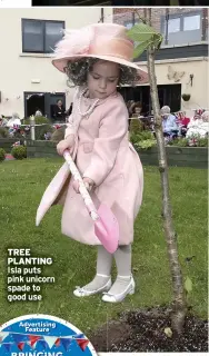  ?? ?? TREE PLANTING Isla puts pink unicorn spade to good use