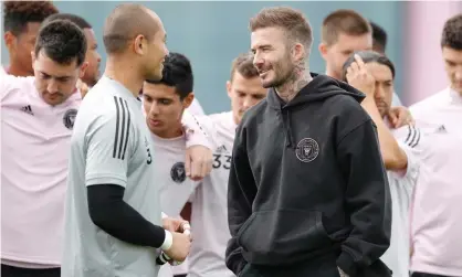  ?? Photograph: Michael Reaves/Getty Images ?? Inter Miami co-owner David Beckham talks with goalkeeper Luis Robles during a training session in February.
