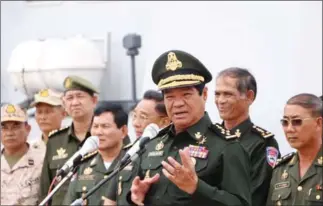  ?? FACEBOOK ?? Deputy Commander in Chief of the Royal Cambodian Armed Forces (RCAF) Kun Kim speaks at an event last month in Sihanoukvi­lle.