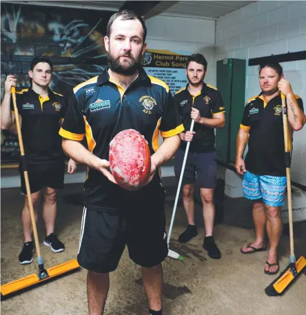  ?? Picture: ALIX SWEENEY ?? TOUGH TIMES: Tigers players Jason Di Betta, Brennan Gibson, Declan Wode and Brett Hughes start the clean-up at the club’s clubhouse at Murray Sports Complex.