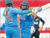  ?? REUTERS ?? India captain Mithali Raj (right) is congratula­ted by Veda Krishnamur­thy on completing her century against New Zealand.