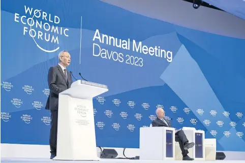  ?? AFP ?? China’s Vice Premier Liu He, left, speaks as WEF founder Klaus Schwab listens during a session of the World Economic Forum annual meeting in Davos on Tuesday.