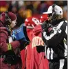  ?? ED ZURGA/AP ?? Referee Ronald Torbert reviews a play at Sunday’s Chiefs-bengals AFC championsh­ip game in Kansas City, Missouri. The game featured some infuriatin­g flags and missed calls.