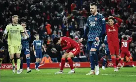  ?? Photograph: Peter Powell/EPA ?? Despair for Liverpool’s Takumi Minamino after a missed late chance against Arsenal.