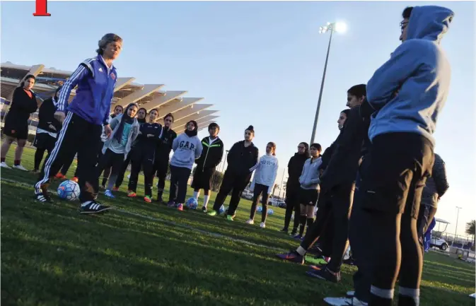  ??  ?? KUWAIT: Kuwaiti women football team with their coach. — KUNA