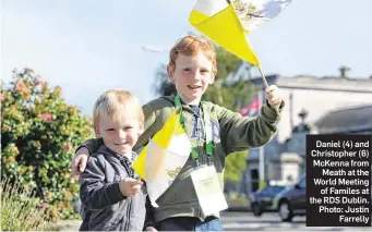  ??  ?? Daniel (4) and Christophe­r (6) McKenna from Meath at the World Meeting of Familes at the RDS Dublin. Photo: Justin Farrelly