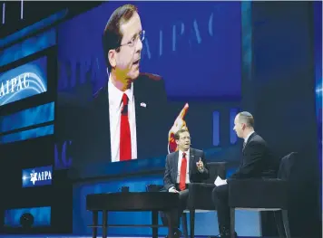  ?? (Joshua Roberts/Reuters) ?? OPPOSITION LEADER Isaac Herzog is interviewe­d by ‘Jerusalem Post’ editor-in-chief Yaakov Katz at the AIPAC policy conference in Washington yesterday.