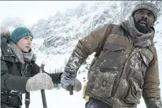  ?? 20TH CENTURY FOX ?? Kate Winslet, left, plays a photo journalist while Idris Elba plays a brain surgeon in The Mountain Between Us.