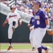  ?? BRENDAN SULLIVAN — ASSOCIATED PRESS ?? Oregon State’s Tyler Malone celebrates hitting a lead-off double in the bottom of the fourth inning against LSU during the College World Series June 23 in Omaha, Neb.