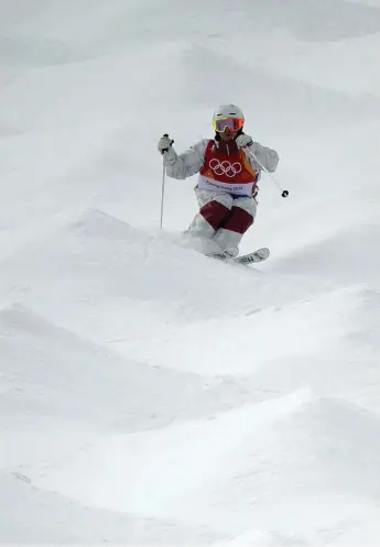  ?? GREGORY BULL/THE ASSOCIATED PRESS ?? Canada’s Andi Naude easily advanced to the women’s moguls final with a strong qualifying run Friday morning.