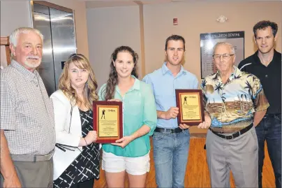  ?? JASON SIMMONDS/JOURNAL PIONEER ?? The Community of Bedeque and Area recently recognized Carsen and Caitlin Campbell for their accomplish­ments in the sport of biathlon locally, nationally and internatio­nally. From left: Ron Rayner, chairman of the Community of Bedeque and Area; Nicole...