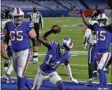  ?? ADRIAN KRAUS- THE ASSOCIATED PRESS ?? Buffalo Bills wide receiver Stefon Diggs (14) celebrates after scoring a touchdown during the second half of an NFL divisional round football game against the Baltimore Ravens Saturday, Jan. 16, 2021, in Orchard Park, N.Y.