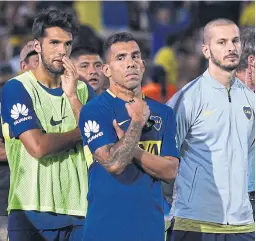  ?? G. garello / jam media ?? Mas, tevez y Benedetto, rostros de frustració­n