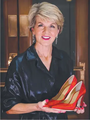  ?? Picture: KYM SMITH ?? Julie Bishop is not in Kansas anymore as she hands over to the Museum of Australian Democracy in Canberra the red heels she wore when announcing her resignatio­n as Foreign Minister.