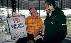  ?? ?? Fred Clarke receives his 25-year Outstandin­g Contributi­on Award at Brands Hatch in October from Bennetts BSB race and series director Stuart Higgs. Picture courtesy of Double Red