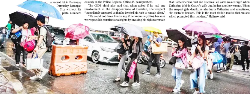  ?? PHOTOGRAPH BY YUMMIE DINGDING FOR THE DAILY TRIBUNE @tribunephl_yumi ?? WITH the sudden Wednesday afternoon rain, pedestrian­s along Buendia-Taft Avenue open their umbrellas to shield themselves from the downpour.