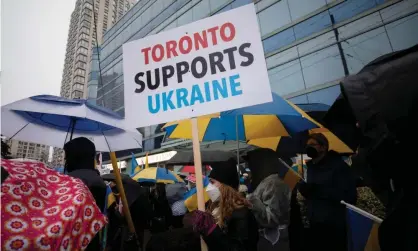  ?? ?? People rally outside the Ukrainian consulate in Toronto. Photograph: Nick Iwanyshyn/Reuters