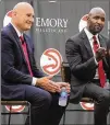  ?? CURTIS COMPTON / CCOMPTON@AJC.COM ?? General manager Travis Schlenk (left) and coach Lloyd Pierce are facing several decisions about next season’s Hawks roster.