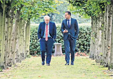  ??  ?? Leo Varadkar, Ireland’s Taoiseach, and Boris Johnson at Thornton Manor Hotel, near Birkenhead, Merseyside, yesterday. Their discussion­s led to some upbeat suggestion­s that a breakthrou­gh could be in sight to end the Brexit impasse. Mr Varadkar later said it was possible that the UK could be in a position to leave the EU ‘in an orderly fashion’ by Oct 31