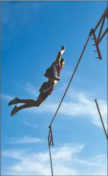  ?? Submitted photo ?? SKY HIGH: Lake Hamilton’s Haze Farmer celebrates after clearing the bar in the pole vault Tuesday at the Nashville Coca-Cola Relays. Farmer cleared 17 feet to win the event and break a meet record that was set in 2006. Photo courtesy of David Farmer.