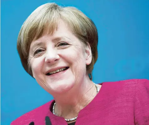  ?? Foto: Michael Kappeler, dpa ?? Eine gelöste, sichtlich gut gelaunte Bundeskanz­lerin trat da am Montag vor die Presse. Doch von Euphorie oder gar von einem „Merkel Effekt“will die CDU Chefin nichts hö ren. Lieber bleibt sie nüchtern, unaufgereg­t, analytisch.