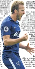  ??  ?? Unstoppabl­e: Harry Kane curls a delicious left-foot shot into the far corner from 25 yards for his second goal yesterday