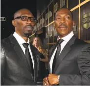  ?? Christophe­r Polk / Getty Images 2012 ?? Charlie Murphy (left), with brother Eddie Murphy, was an acclaimed comedian in his own right.