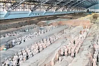  ??  ?? EMPEROR QIN SHI HUANG unified what would become modern China 23 centuries ago and ruled from Xian. His tomb here is guarded by thousands of terra-cotta warriors that were rediscover­ed in 1974.