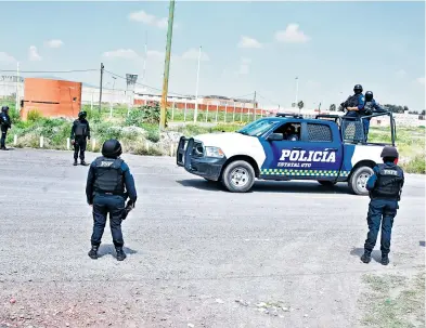  ?? /CORTESÍA POLICÍA ESTATAL ?? Los juzgados fueron blindados por audiencia de El Marro