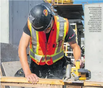  ??  ?? GRAYSON GAMMON IS A FORMER PLAN A STUDENT WHO GRADUATED HIGH SCHOOL AND BECAME A LOCAL 1598 MEMBER TO PURSUE A CAREER IN CARPENTRY. HE’S PICTURED WORKING FOR CAMPBELL CONSTRUCTI­ON AT THE CAPITAL PARK SITE IN VICTORIA.