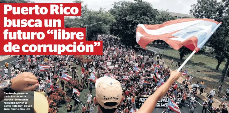  ?? /EFE ?? Cientos de personas participar­on en la marcha “Somos más” realizada ayer en el barrio Hato Rey de San Juan, Puerto Rico.