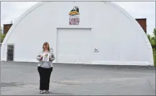  ?? ADAM MACINNIS/THE NEWS ?? Kristi Russell stands in front of the New Glasgow Farmers Market Dome that she hopes will be replaced with a heated barn-like structure.