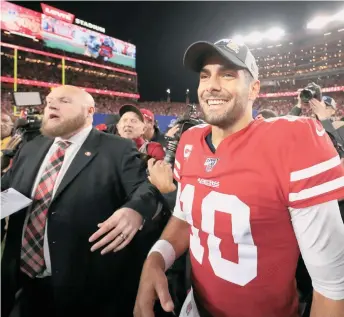  ?? GETTY IMAGES ?? Jimmy Garoppolo no deja de ganar como quarterbac­k y no deja de sonreír.