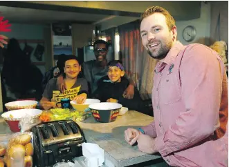  ?? DARREN MAKOWICHUK ?? Jeff Gray, Cornerston­e’s executive director, with some of the young people that hang out and use the centre on a regular basis, on Monday. The focus here is on kids in Grades 6 to 9, Gray says.