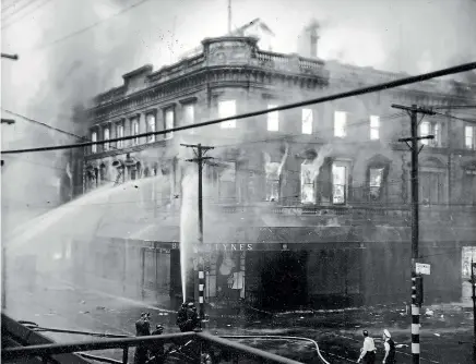  ?? ?? Flames roar through Ballantyne­s in Christchur­ch at the height of the 1947 fire. Most of the 41 victims were trapped in the upper floors.