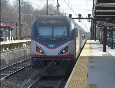  ?? PETE BANNAN - MEDIANEWS GROUP ?? An Amtrak train departs from Exton train station just prior to the ribbon-cutting for the improved station. Funding may finally be available to bring back passenger rail along the Route 422corrido­r from Reading to Philadelph­ia with stops in Montgomery and Chester counties.